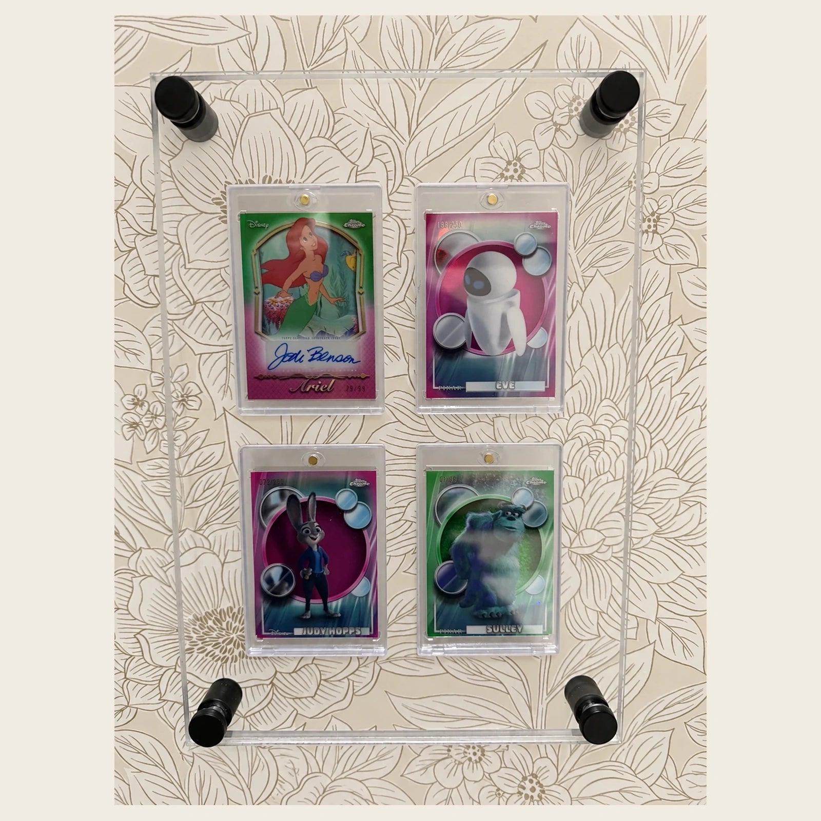 WALL/04 Four Card Grid clear acrylic wall display shown with example cards